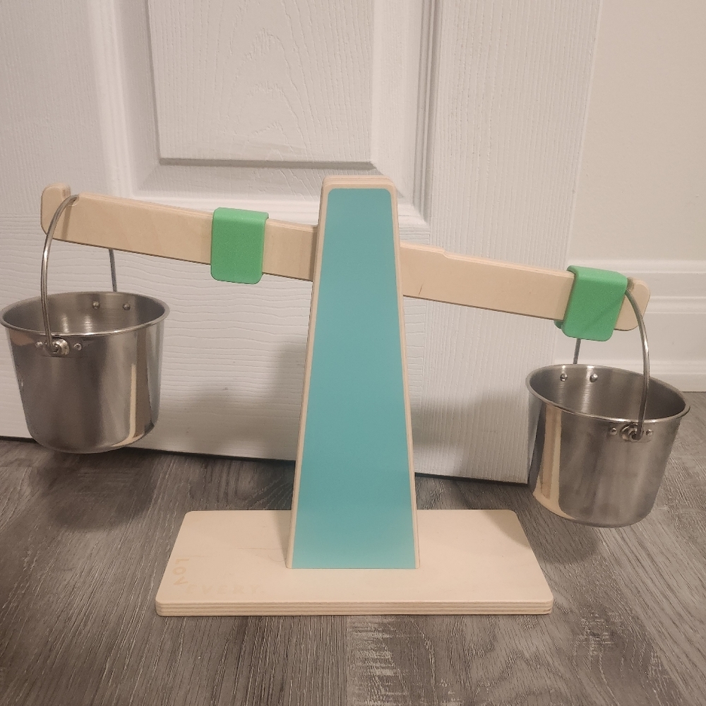 Lovevery scale and 2 pails